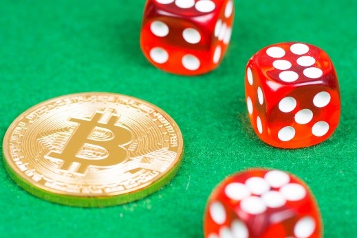A bitcoin chip with dice